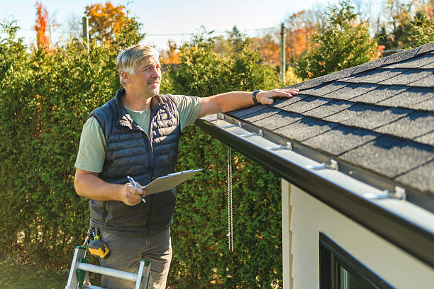Professional Hail Damage Roof Repair technician working in Harvey, IL